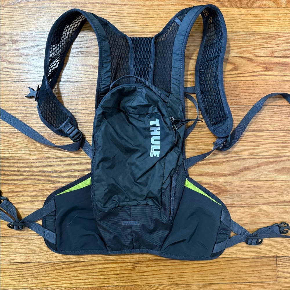 Thule Black Backpack with Green Highlights